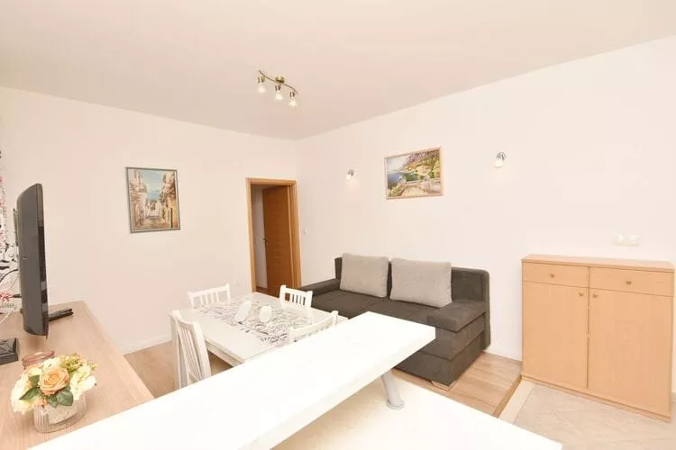 Green Hills Apartment - One Bedroom Apartment with Balcony and Sea View-Living room