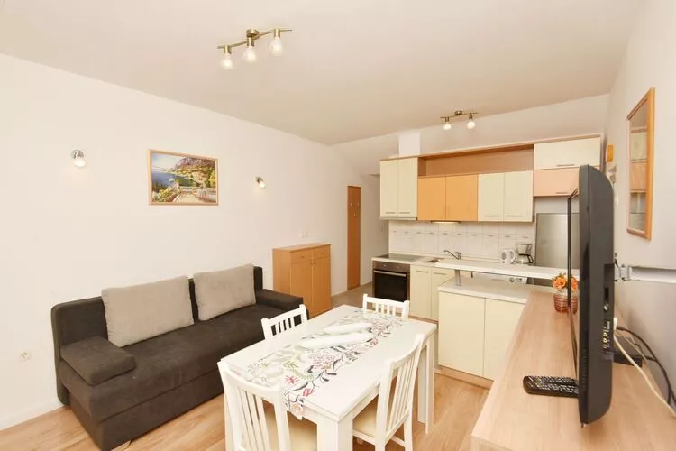 Green Hills Apartment - One Bedroom Apartment with Balcony and Sea View-Living room