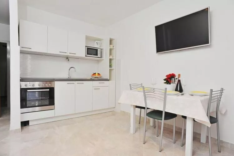 Apartments Lenka - One Bedroom Apartment with Balcony and garden View A2-Kitchen