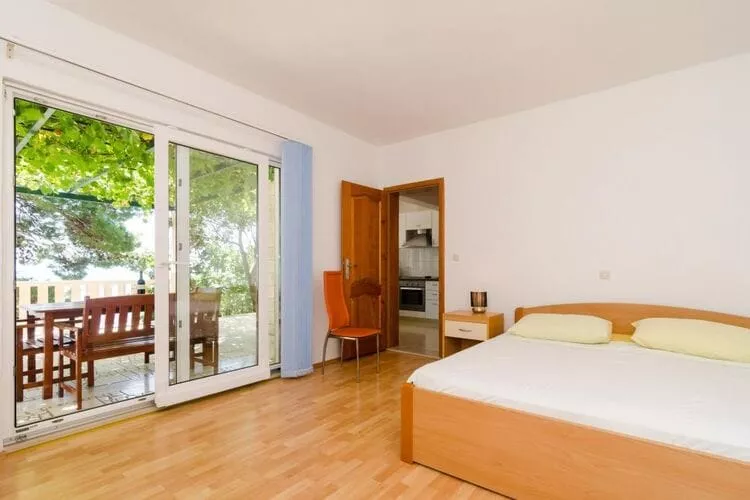 Apartments Plavac Mali- Comfort One Bedroom Apartment with Terrace and Sea View-Schlafzimmer