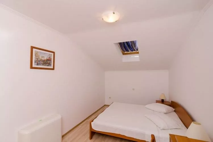 Apartments Plavac Mali- Two Bedroom Apartment with Balcony and Sea View-Bedroom