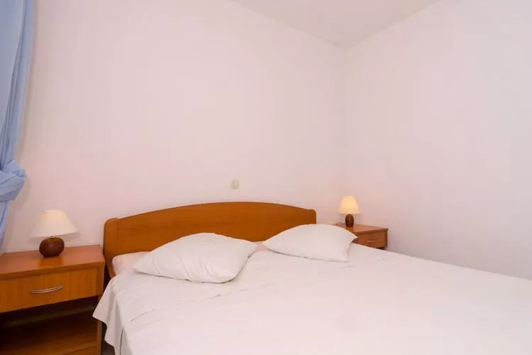 Apartments Plavac Mali- Two Bedroom Apartment with Balcony and Sea View-Bedroom