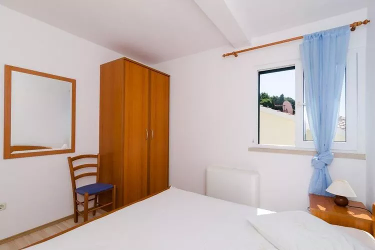 Apartments Plavac Mali- Two Bedroom Apartment with Balcony and Sea View-Bedroom
