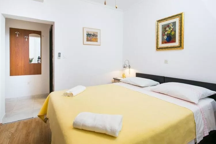 Guest House Kusalo-  Basic Triple Room with Patio (Soba 3)-Bedroom