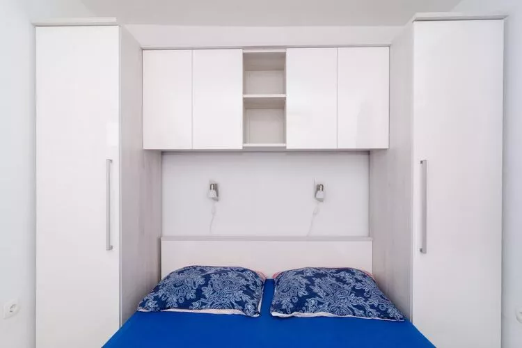 Apartments Ammos - One Bedroom Apartment with Shared Terrace and Sea View (Mali)-Bedroom