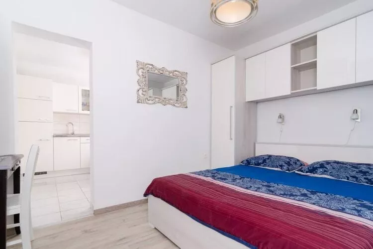 Apartments Ammos - One Bedroom Apartment with Shared Terrace and Sea View (Mali)-Bedroom