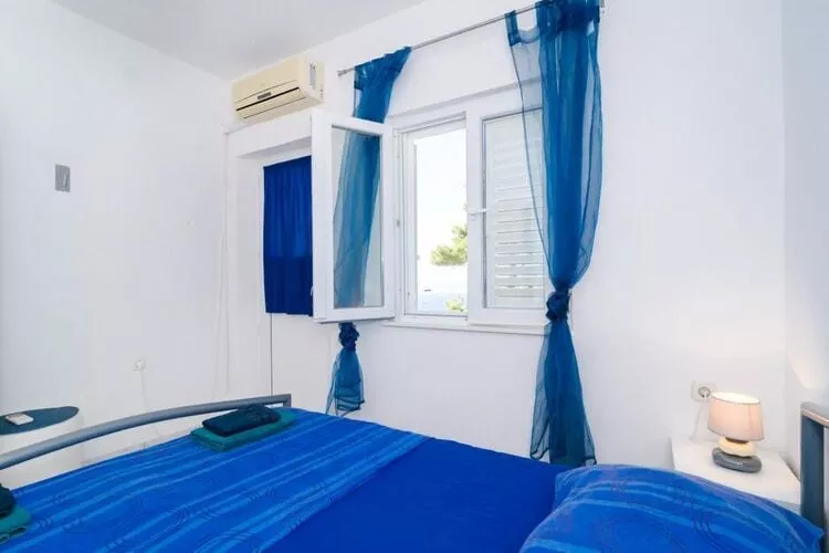 Apartments Ammos - Studio Apartment with Shared Terrace and Sea View-Bedroom