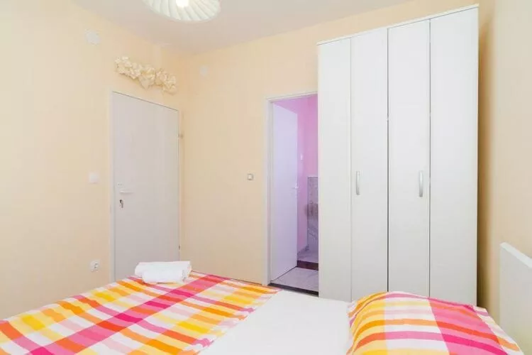 Apartments & Rooms Tapera- Comfort One-Bedroom Apartment with Terrace and Garden View ( NARANČASTI 1 )-Bedroom