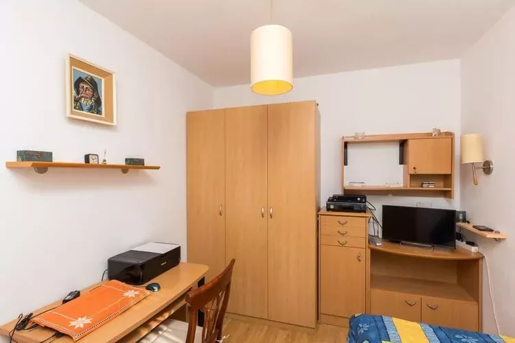 Apartment Jele - Two Bedroom Apartment with Balcony and Garden View-Bedroom