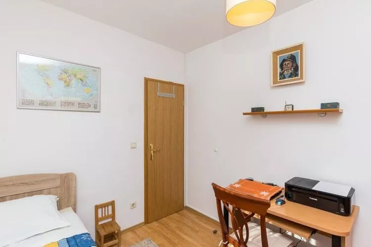 Apartment Jele - Two Bedroom Apartment with Balcony and Garden View-Bedroom
