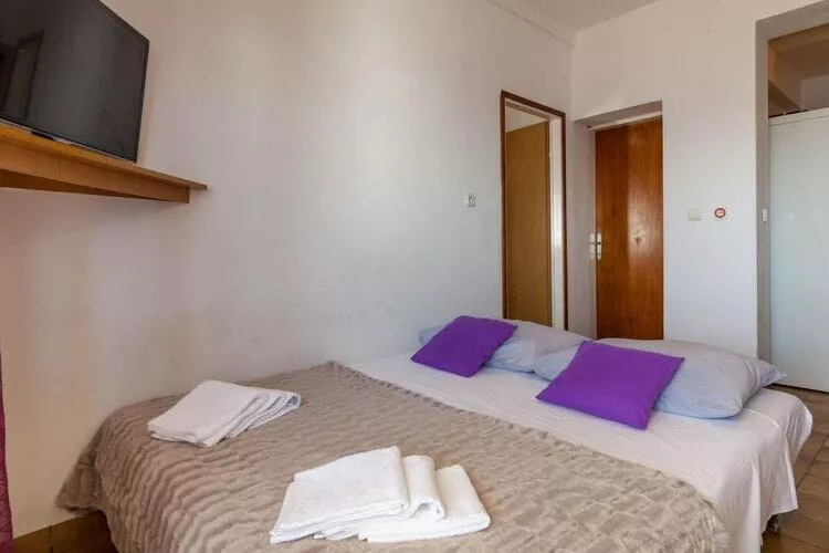 Apartments Nena (ST) - One Bedroom Apartment with Terrace and Sea View (A4)-Bedroom