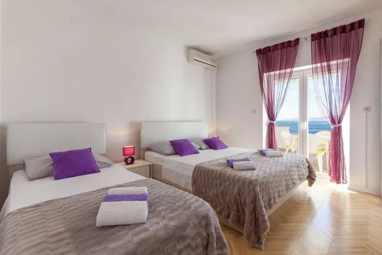 Apartments Nena (ST) - One Bedroom Apartment with Balcony and Sea View (A1)-Bedroom