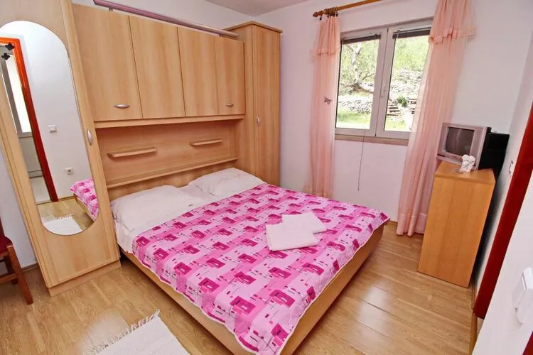 Apartments Radojković Lumbarda -One Bedroom Apartment with Terrace and Partial Sea View(A1)-Bedroom