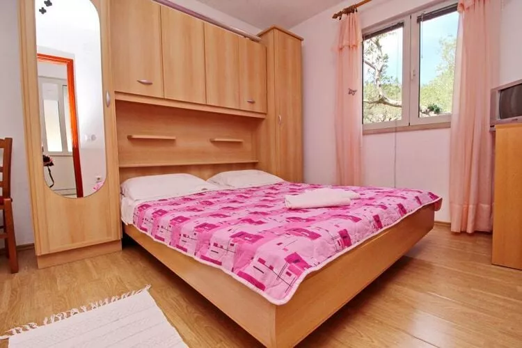 Apartments Radojković Lumbarda -One Bedroom Apartment with Terrace and Partial Sea View(A1)-Bedroom