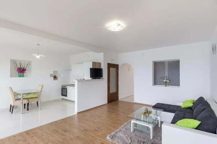 Apartment Manuela - One-Bedroom Apartment with Balcony and Sea View-Living room