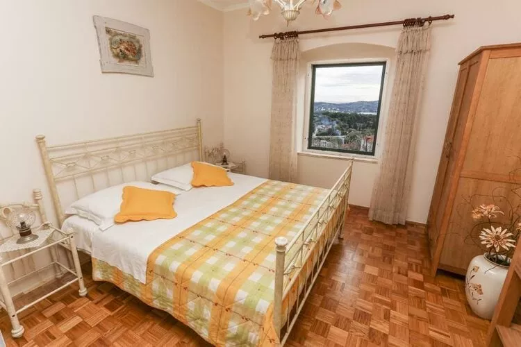 Apartment& Rooms Savonari  - Comfort  Double Room with Patio and Sea View (Soba 2)-Bedroom