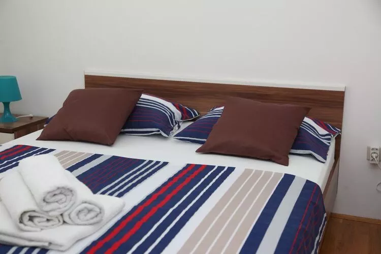 Apartment Toma (ST) - Comfort Two Bedroom Apartment with Terrace and Sea View (A2 - gornji)-Bedroom