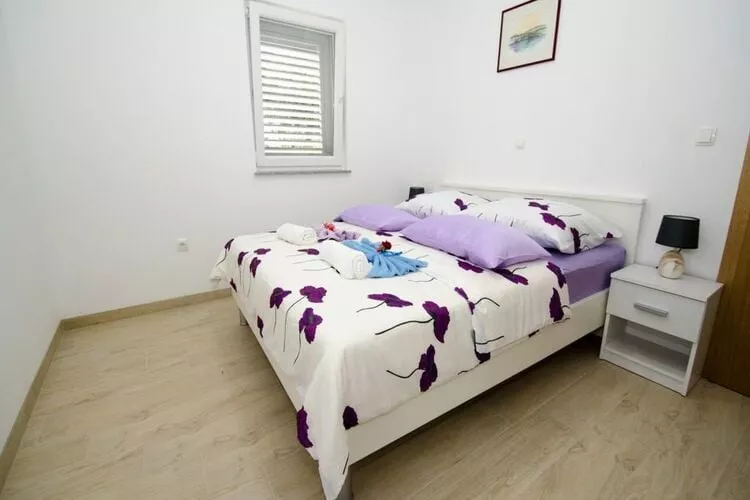Apartments Vesela - Comfort One Bedroom Apartment with Balcony and Sea View-Bedroom