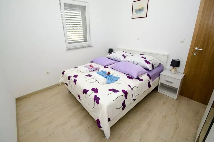 Apartments Vesela - Comfort One Bedroom Apartment with Balcony and Sea View-Bedroom