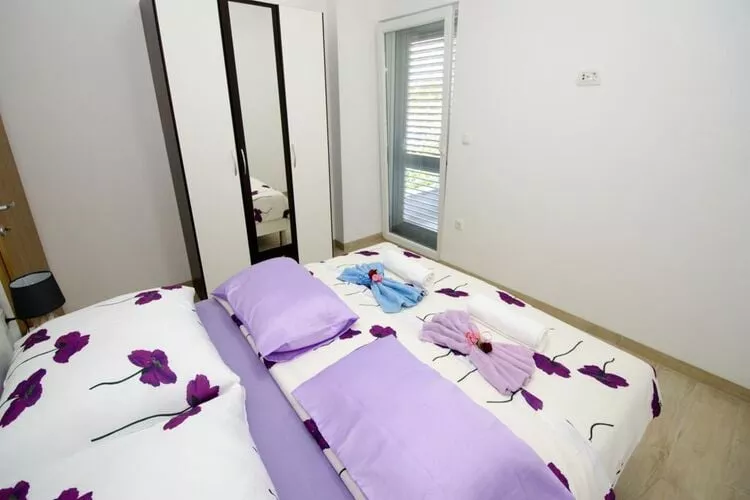 Apartments Vesela - Comfort One Bedroom Apartment with Balcony and Sea View-Bedroom