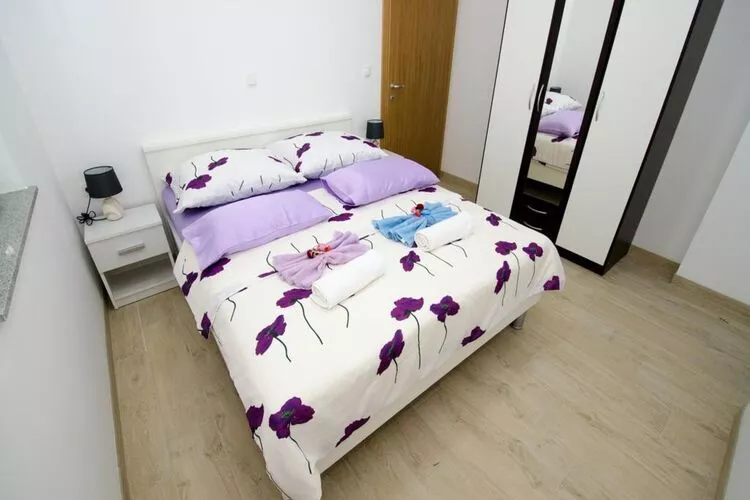 Apartments Vesela - Comfort One Bedroom Apartment with Balcony and Sea View-Bedroom