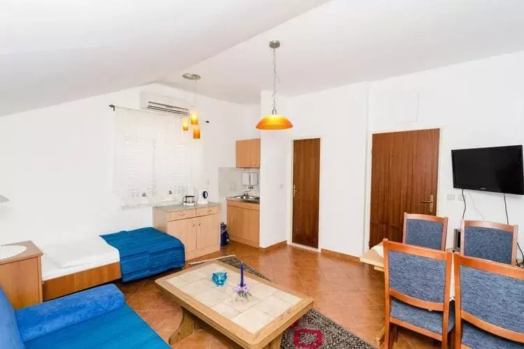 Apartments Peco - One Bedroom Apartment with Patio and Side Sea View-Salon