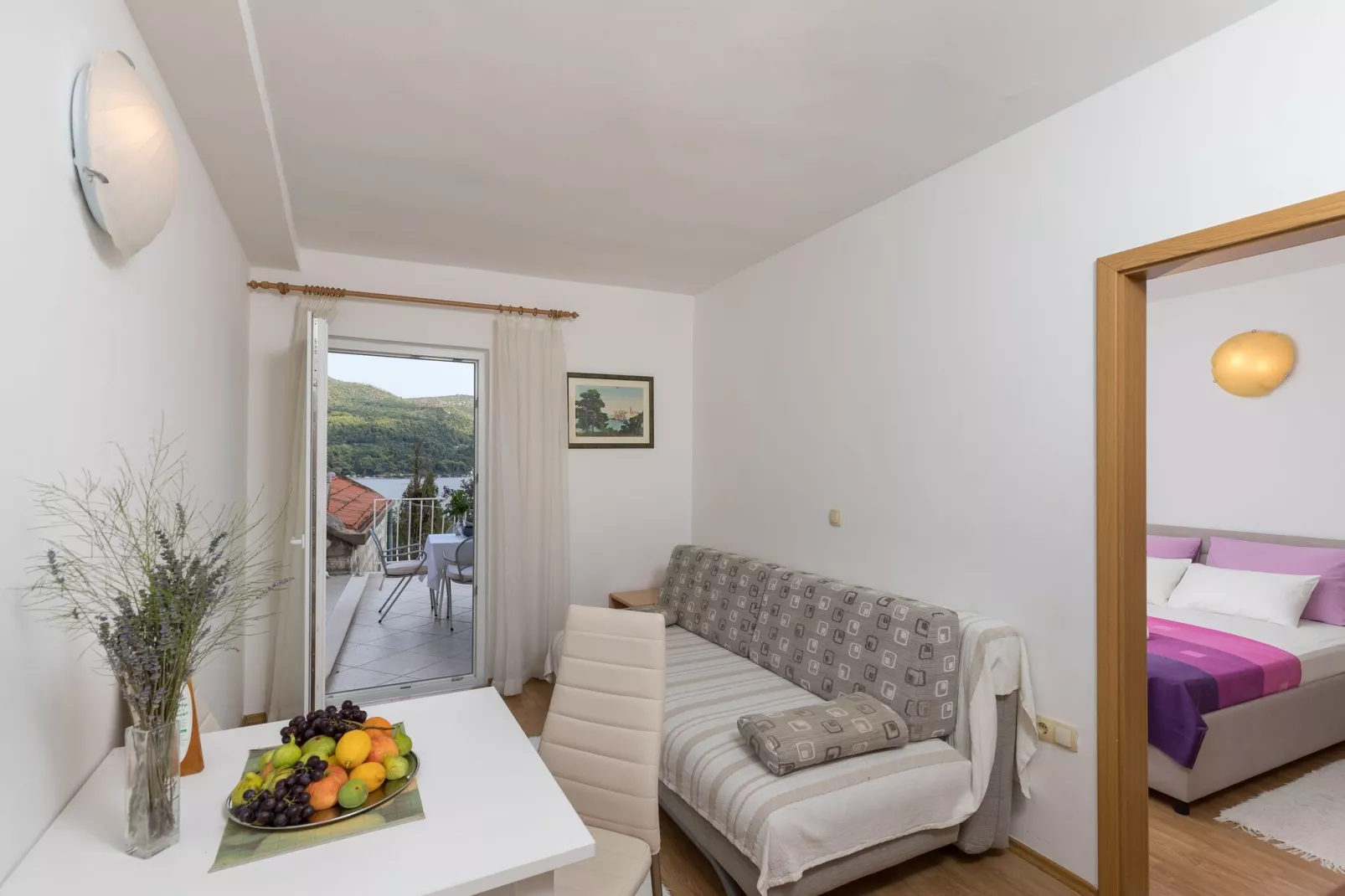 Apartments & Room Eva Slano - One Bedroom Apartment with Terrace and Sea View ( Srednji )-Salle à manger