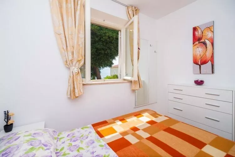Apartment Charming Arena - One Bedroom Apartment with Terrace and Sea View-Schlafzimmer