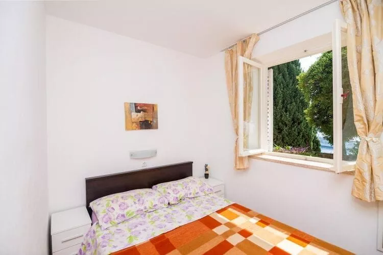 Apartment Charming Arena - One Bedroom Apartment with Terrace and Sea View-Schlafzimmer