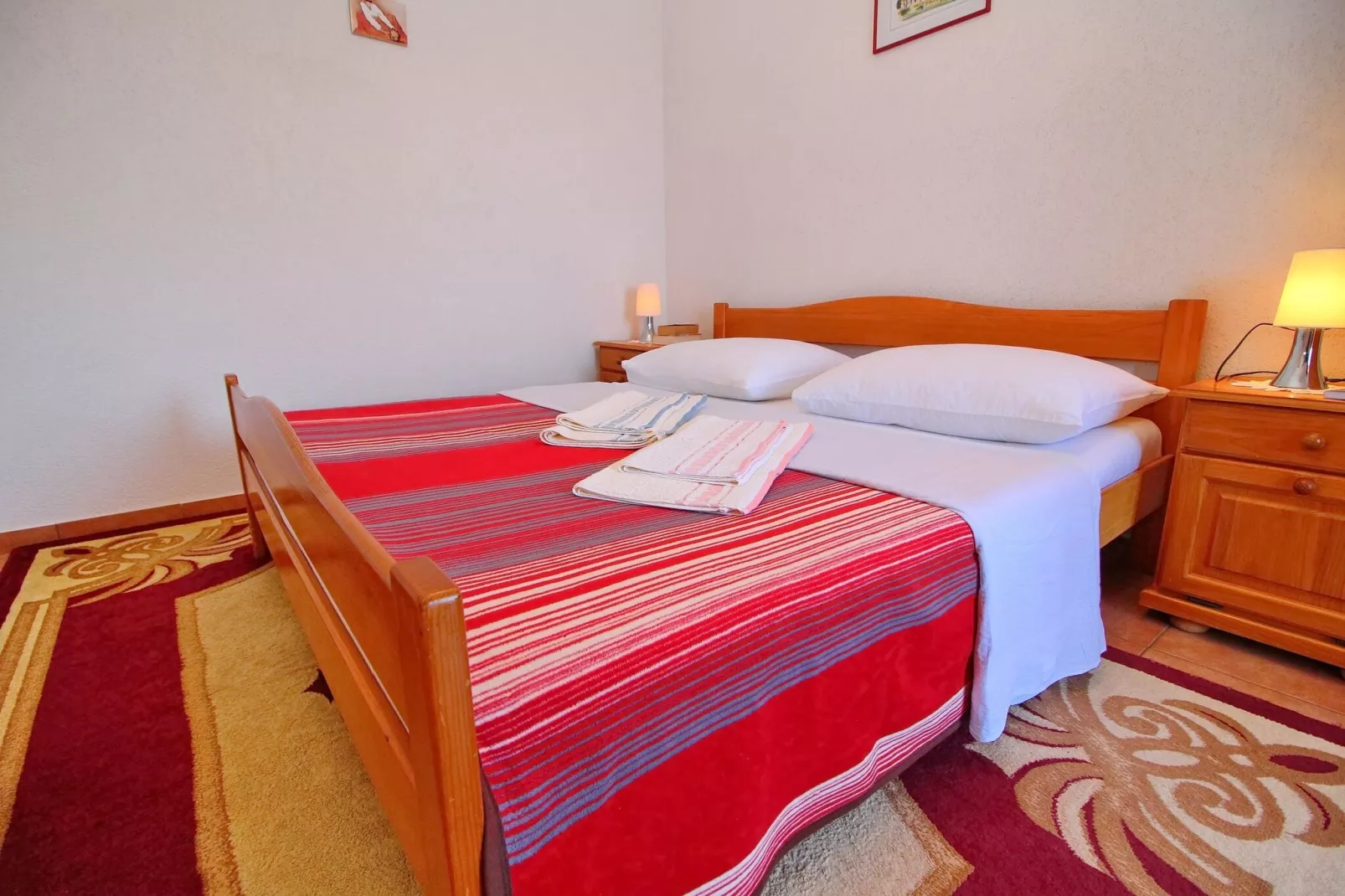 Apartments Filipović - Comfort One-Bedroom Apartment with Balcony and Sea View (A2)-Bedroom