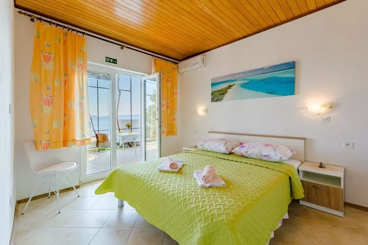 Rooms Sani - Double Room with Terrace and Sea View (S3)-Schlafzimmer