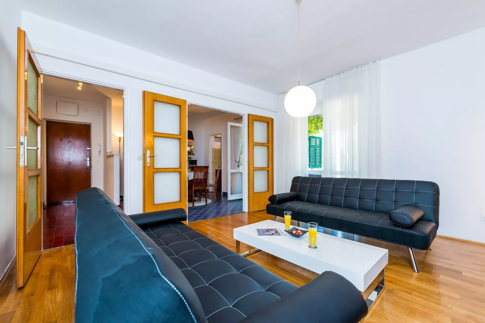 Apartment Valonija - Two Bedroom Apartment with Terrace and Garden View-Living room