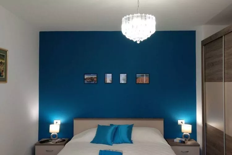 Apartment Hitri - One Bedroom Apartment with Terrace and Garden View-Bedroom