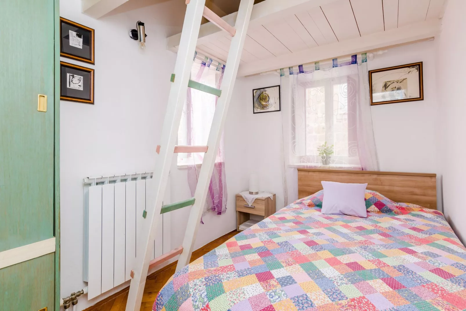 Art House Zanze- Two Bedroom Apartment with City View-Schlafzimmer