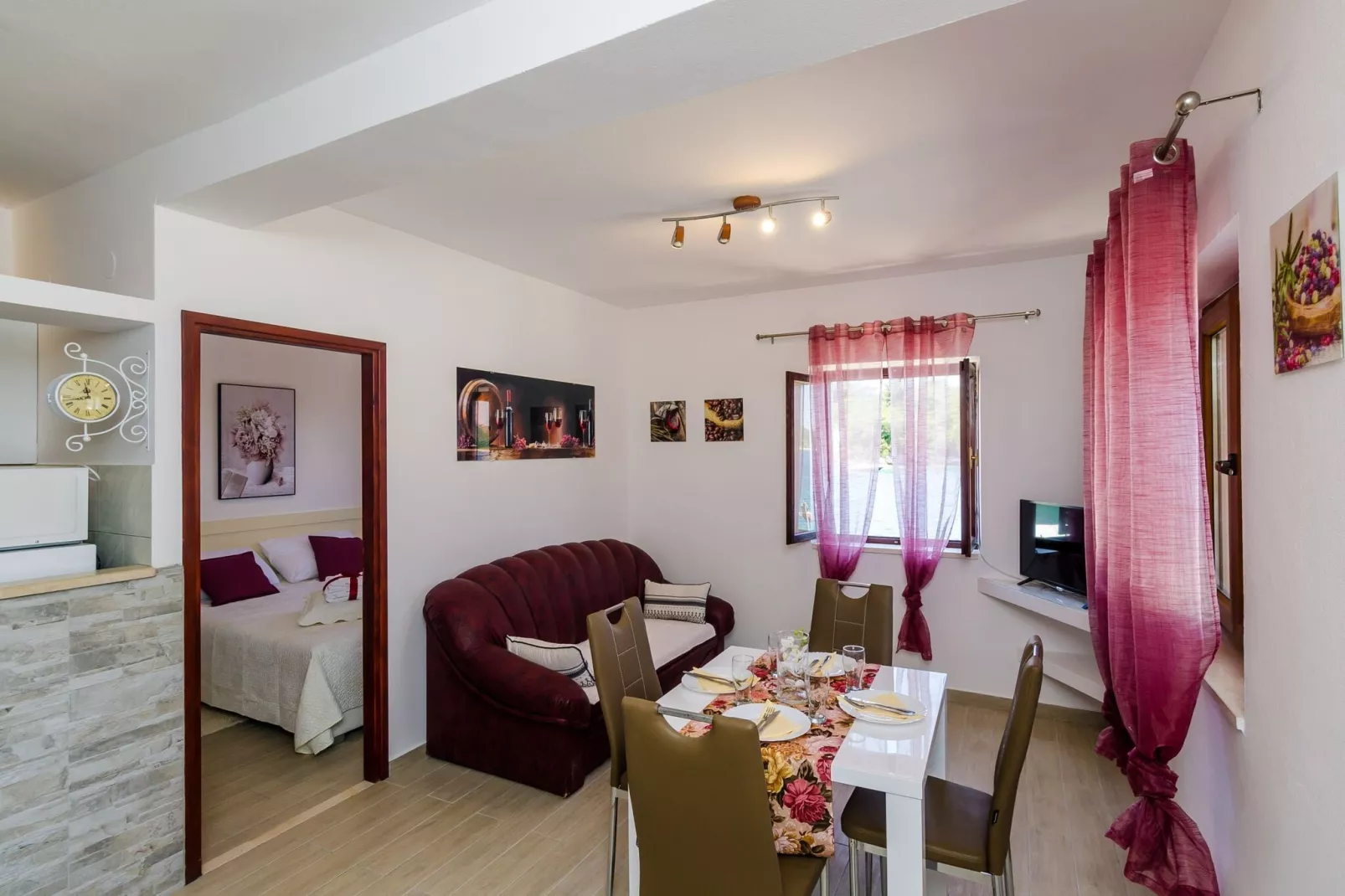 Apartments Melany - One Bedroom Apartment with Shared Terrace and Sea View-Living room