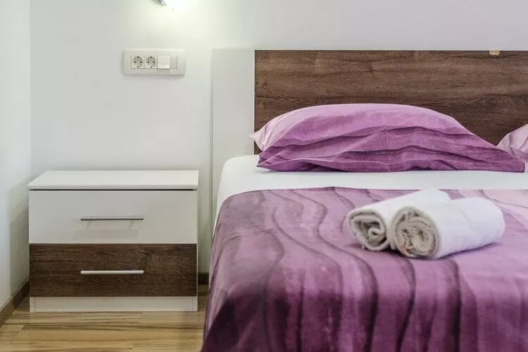 Apartments Hope (Dugi Rat) - Three-Bedroom Apartment with Jacuzzi and Terrace with Sea View-Bedroom