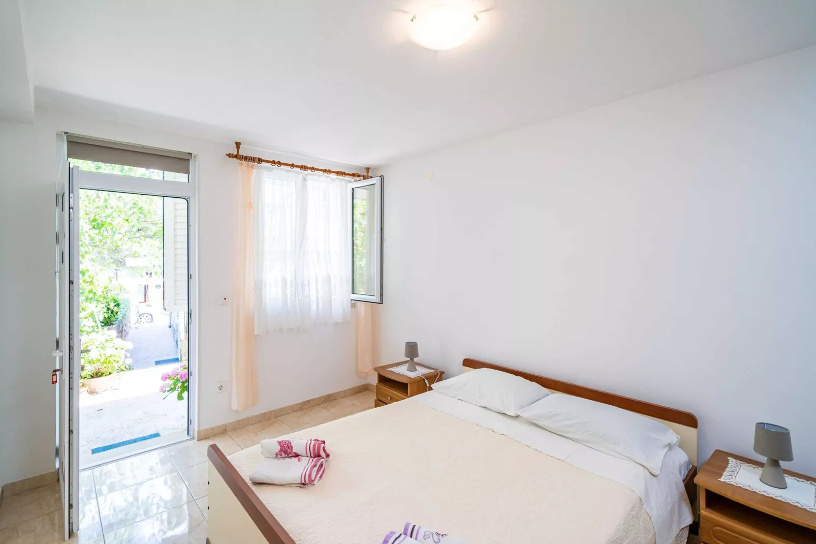 Apartments Zarac - One Bedroom Apartment with Terrace-Bedroom