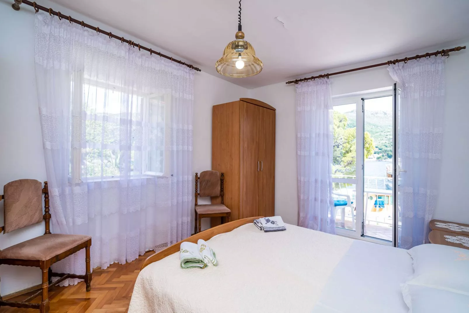 Apartments Zarac - One Bedroom Apartment with Balcony and Sea View (Milanka)-Bedroom