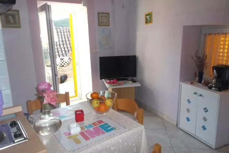 Apartments Sunce - One Bedroom Apartment with Sea View and Terrace (PLAVI)-Living room