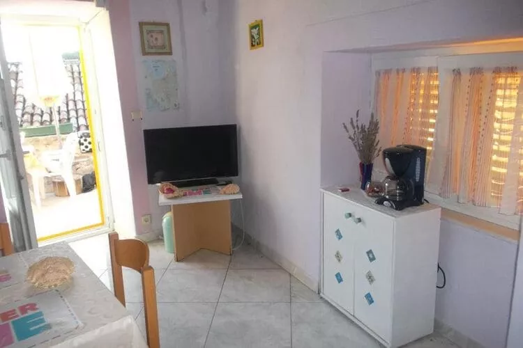 Apartments Sunce - One Bedroom Apartment with Sea View and Terrace (PLAVI)-Living room