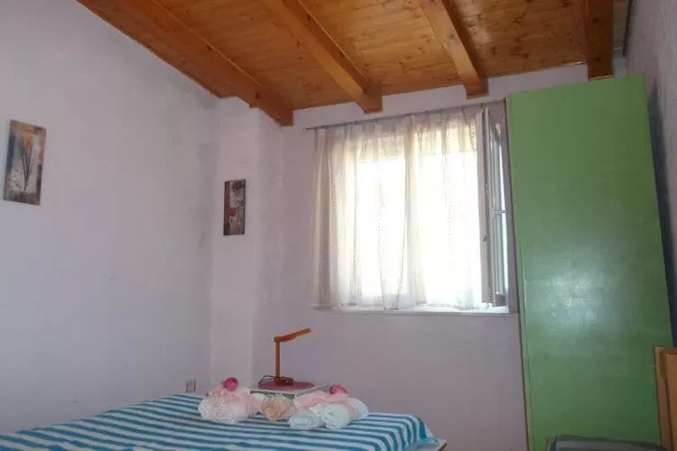 Apartments Sunce - One Bedroom Apartment with Sea View and Terrace (PLAVI)-Bedroom