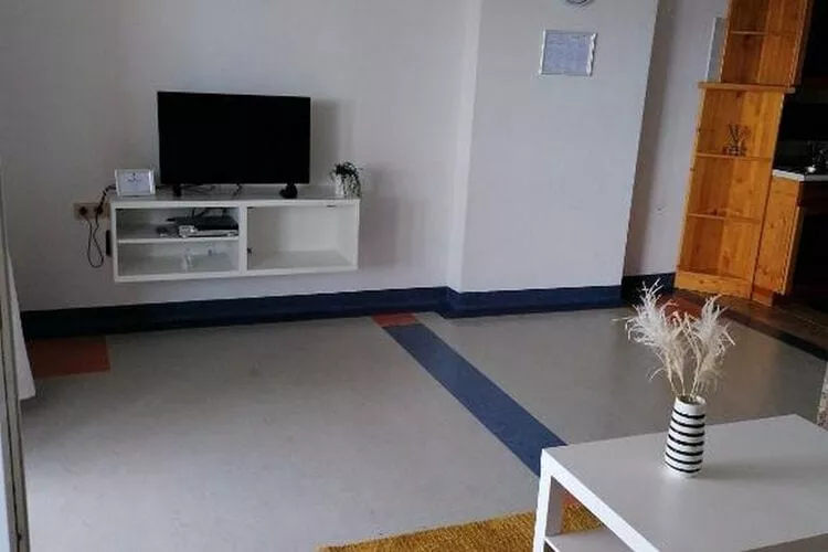 House Panorama - One Bedroom Apartment with Balcony and Sea View (Panoramahaus)-Living room