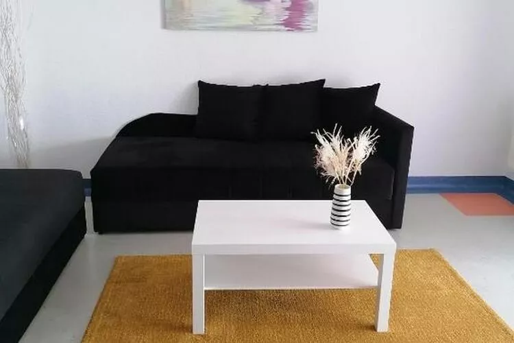 House Panorama - One Bedroom Apartment with Balcony and Sea View (Panoramahaus)-Living room