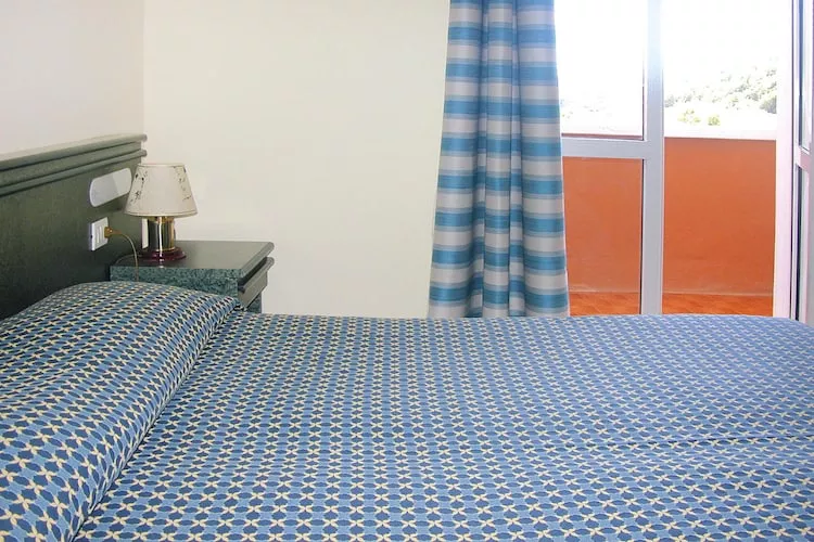 TH Holiday resort Ortano Mare Village & Residence Rio Marina-Bilo 5 Le Ville-1 piano balcone-Bedroom