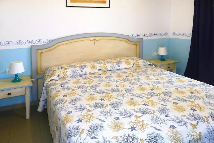 TH Holiday resort Ortano Mare Village & Residence Rio Marina-Bilo 5 Le Ville-1 piano balcone-Bedroom