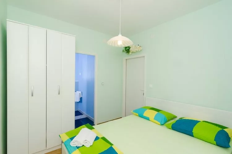 Apartments & Rooms Tapera- Standard One Bedroom Apartment with Terrace and Garden View ( ZELENI 2 )-Bedroom