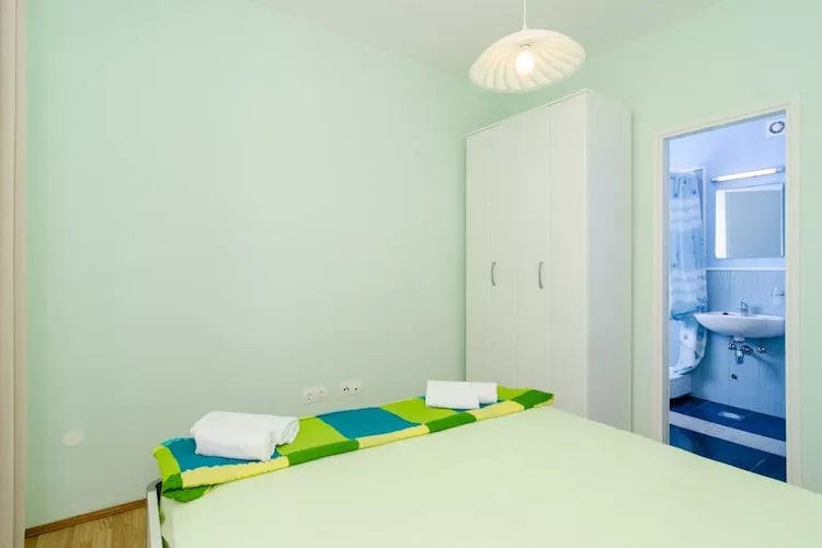 Apartments & Rooms Tapera- Standard One Bedroom Apartment with Terrace and Garden View ( ZELENI 2 )-Bedroom