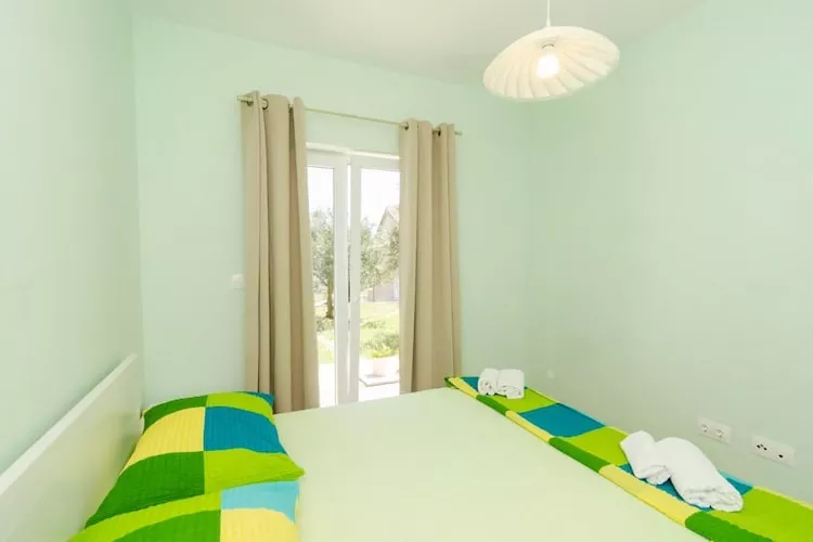 Apartments & Rooms Tapera- Standard One Bedroom Apartment with Terrace and Garden View ( ZELENI 2 )-Bedroom