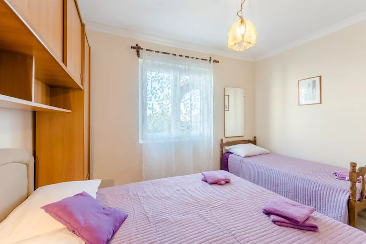 Apartments Fidelis - One Bedroom Apartment with Terrace and Garden View(2)-Bedroom