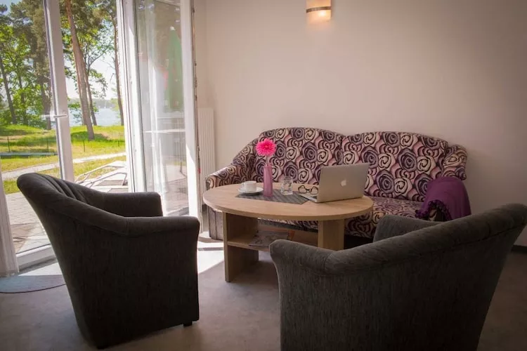 Bungalow am Storkower See-Living room
